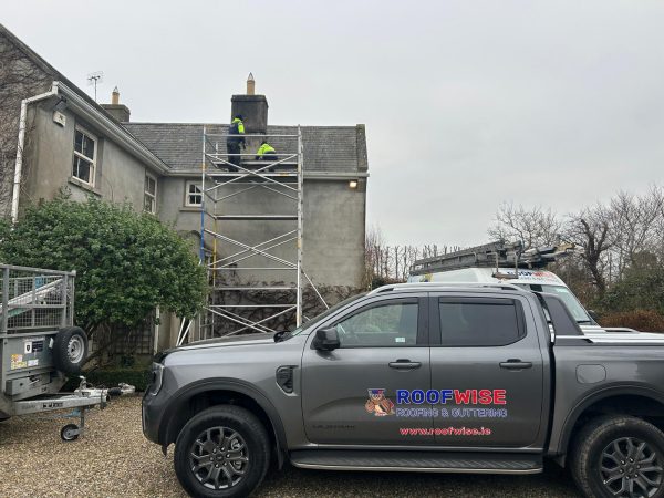 Roofers repairing chimney in Clane, County Kildare