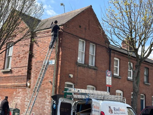 Roofers repairing chimney in Old Kilcullen, County Kildare